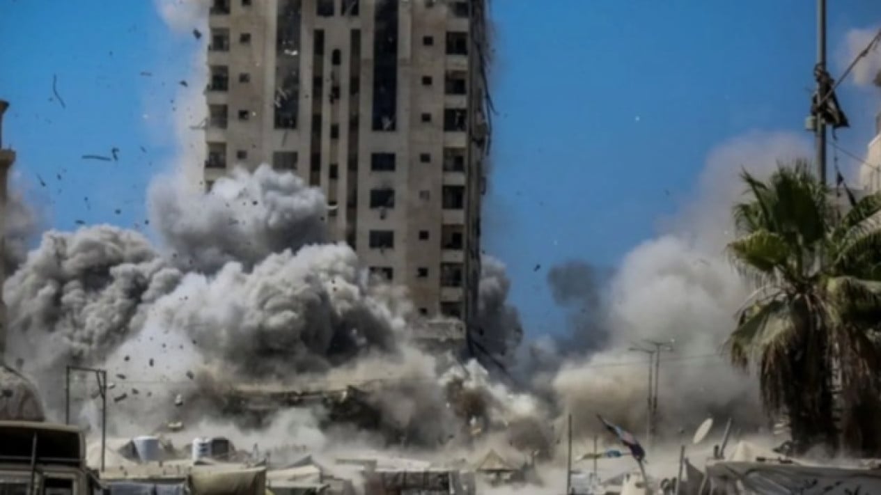 68bb38ed2827c-ilustrasi-pemboman-israel-terhadap-menara-mushtaha-di-jalur-gaza_tangerang